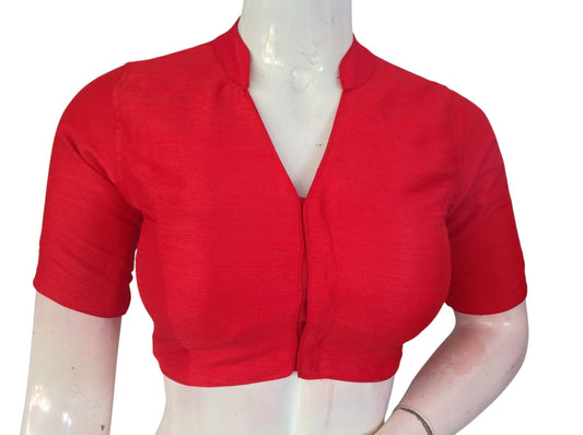 Red semi raw silk collar neck saree blouse with cotton lining. Stitched, padded, ready to wear in sizes 34–40. Perfect for weddings & festive sarees.