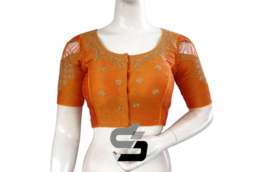 Step into elegance with these readymade semi-silk saree blouses in vibrant mustard orange, adorned with exquisite embroidery and high neck designs for a glamorous look.
