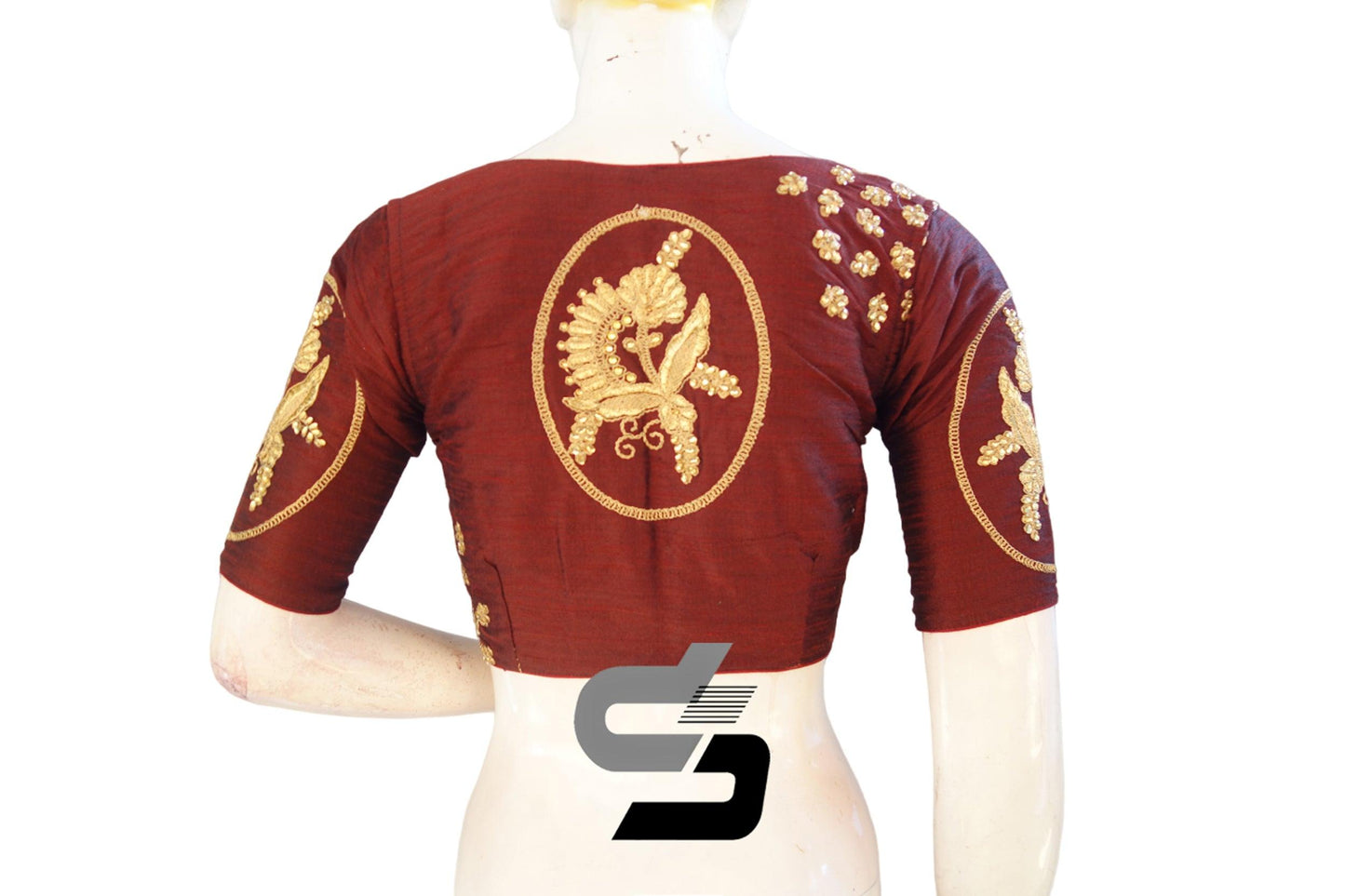 Stay ahead of the fashion curve with our maroon high neck designer semi-silk saree blouses, boasting intricate embroidery for a touch of elegance and flair.