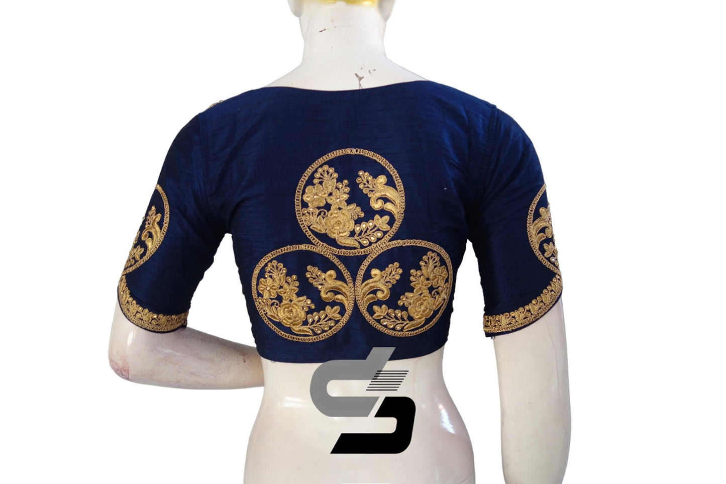 Navy Blue High Neck Embroidered Saree Blouses: Break from Neutrals! Elevate your style with bold sophistication and intricate embroidery, adding a vibrant twist to your ensemble.