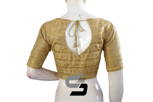 Exude confident charisma with our Gold High Neck Designer Embroidered Saree Blouses. Elevate your style with radiant gold tones and intricate embroidery, making a bold statement wherever you go.