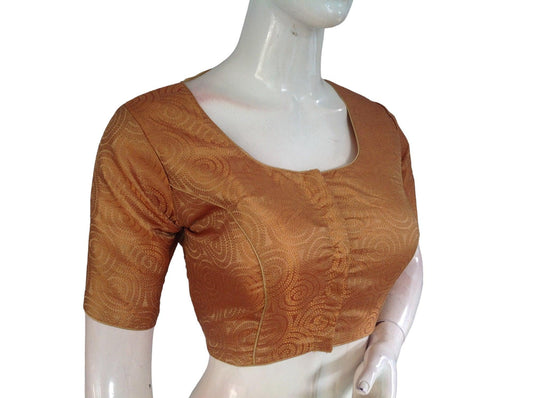 Embrace opulence with our Copper Gold Brocade Readymade Saree Blouse, a signature piece from our Indian Traditional Blouse collection. Crafted with intricate brocade detailing, this blouse adds a regal touch to your ensemble, perfect for enhancing your traditional attire with sophistication and grace.