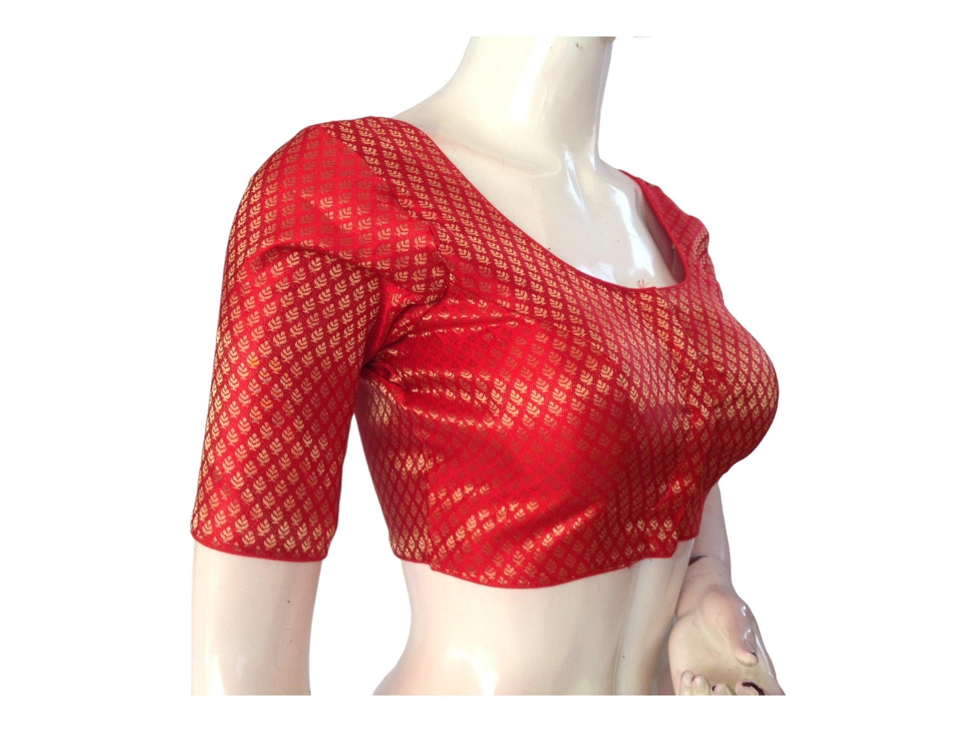 Enhance your attire with our Red Silk Saree Readymade Blouse, featuring intricate brocade detailing designed specifically for plus-size wearers. Elevate your ensemble with a touch of elegance and style, perfect for making a statement at any event.