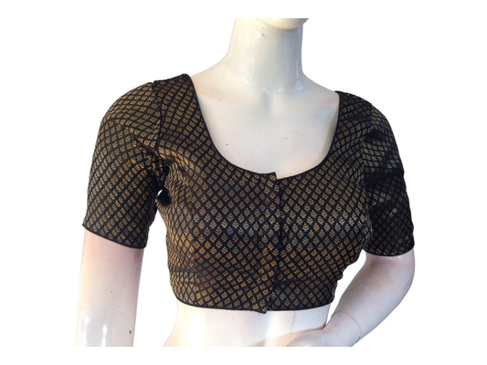 Elevate your wardrobe with our Black Brocade Readymade Saree Blouse. Crafted from luxurious Indian brocade silk, it exudes elegance and sophistication. Perfect for any occasion, it seamlessly combines traditional charm with modern style. Shop now and make a statement with timeless Indian craftsmanship.