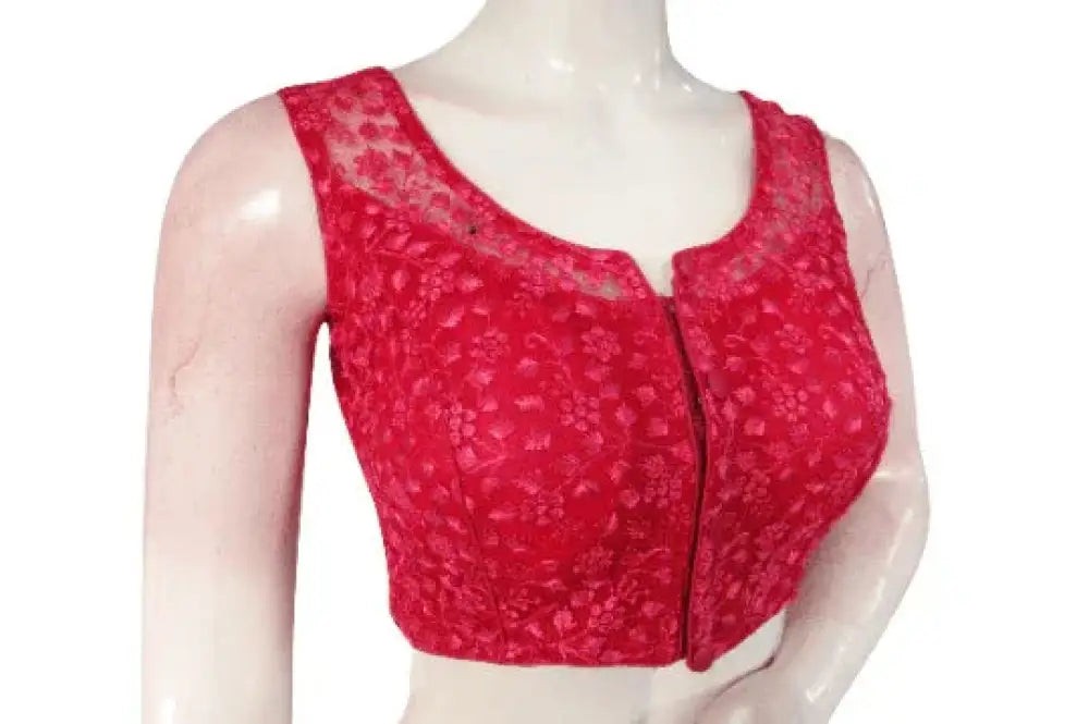 Back view of a padded pink readymade saree blouse showcasing the hook and eye fitting.