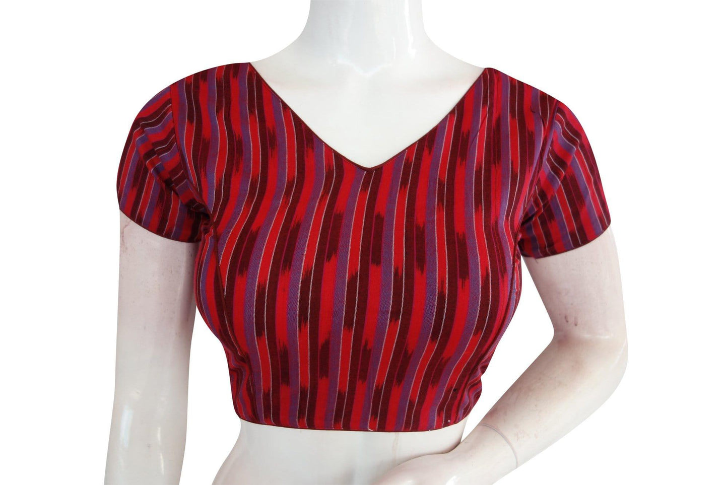 Elevate your elegance with our classic Maroon Ikkat V-Neck Designer Blouse, a timeless piece that embodies women's fashion with grace and sophistication.