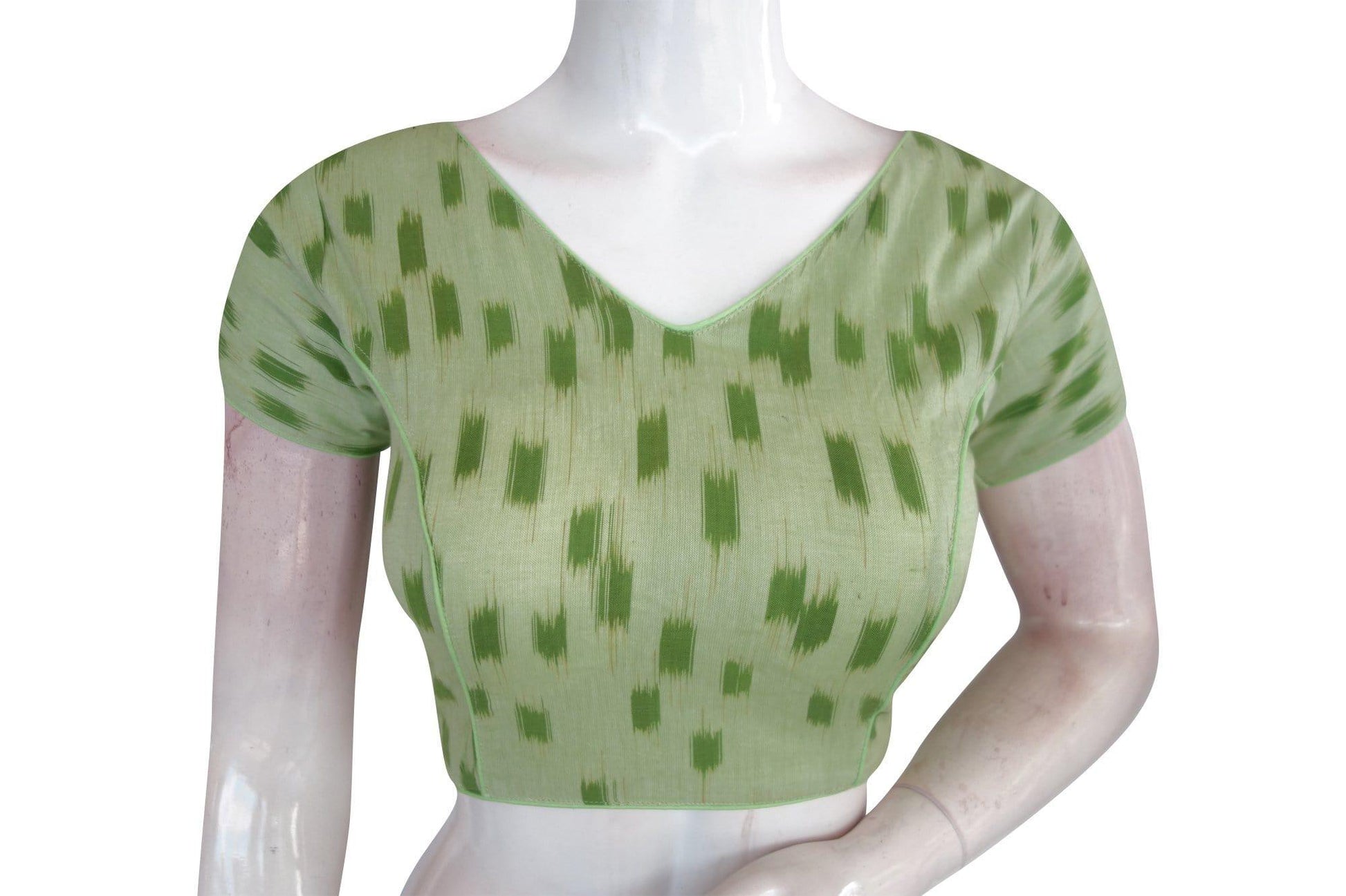Elevate your elegance with our sophisticated Green Ikkat V-Neck Designer Readymade Blouse, a perfect choice for stylish women.