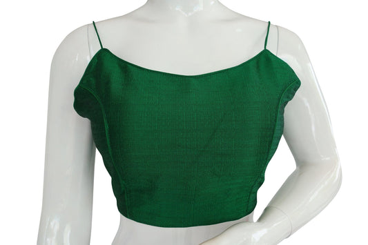 Green Emerald: Elevate your style with our plain sleeveless readymade saree blouse featuring spaghetti straps. Effortlessly chic and versatile, this piece adds a touch of elegance to any ensemble, perfect for various occasions.