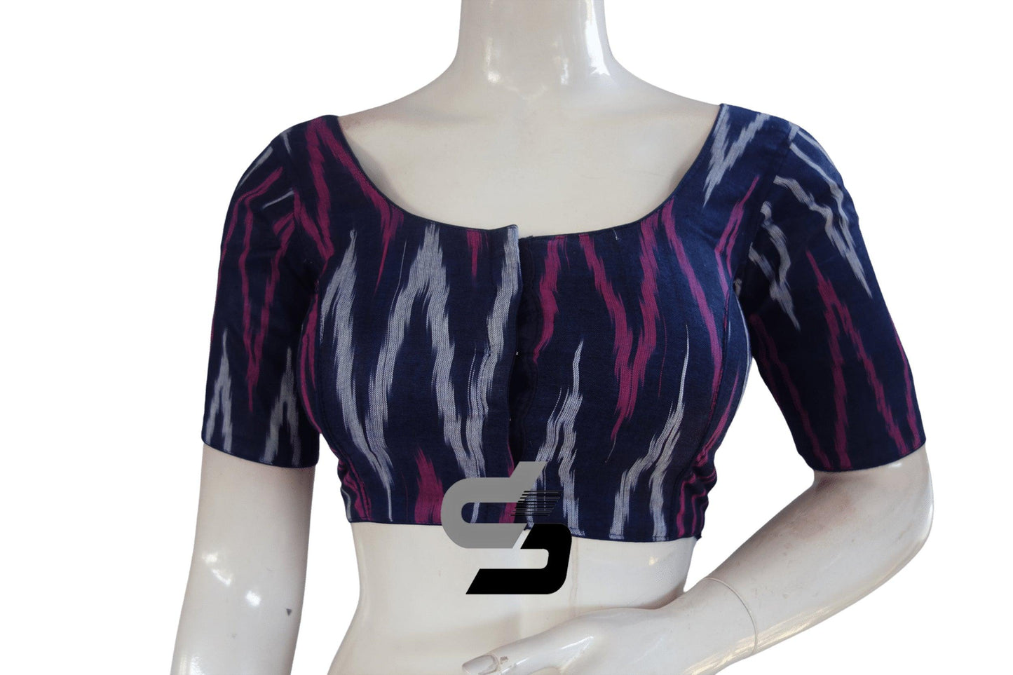 Elevate your style effortlessly with our chic Navy Blue Ikkat Cotton Readymade Blouse, perfect for adding a touch of sophistication to your ensemble.