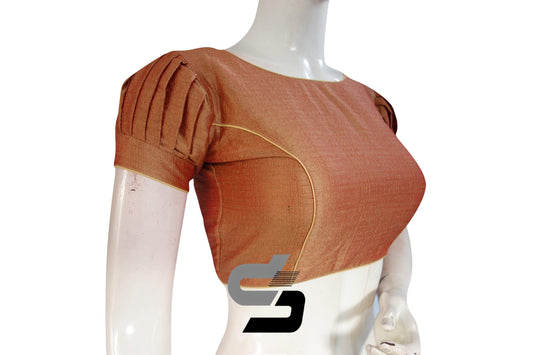 Terracotta Elegance: Elevate your ensemble with this Plain Silk Readymade Saree Blouse featuring chic Puff Sleeves. Effortlessly stylish for any occasion.