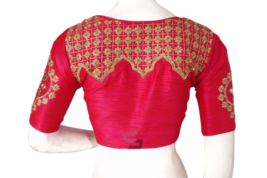 Adorn yourself in designer elegance with our Pink Embroidered High Neck Saree Blouse, showcasing intricate detailing and sophisticated style for a timeless look.