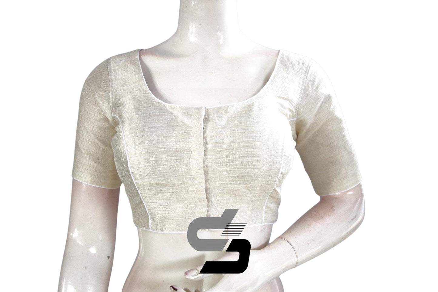 Classic White: Elevate your saree ensemble with this Semi Silk Plain Readymade Saree Blouse in timeless white. The understated elegance of this blouse complements any saree, while the semi-silk fabric offers comfort and style. Perfect for both casual and formal occasions, it's a versatile addition to your wardrobe.