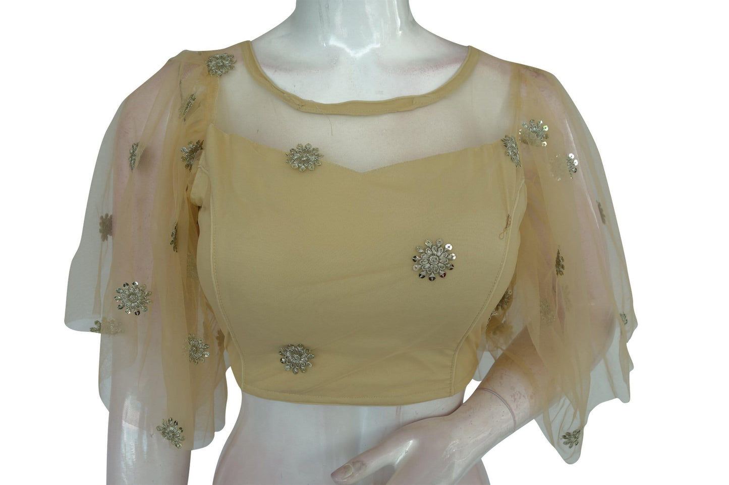 Elevate your elegance with "Beige Elegance," our Organza Netted Frill Designer Readymade Blouse, exuding sophistication and charm with its graceful design and delicate frill detailing.