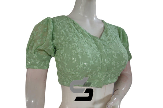 Embrace spring serenity with our Pastel Green High Neck Chikankari Saree Blouse featuring delicate puff sleeves, exuding elegance and grace with a touch of freshness.
