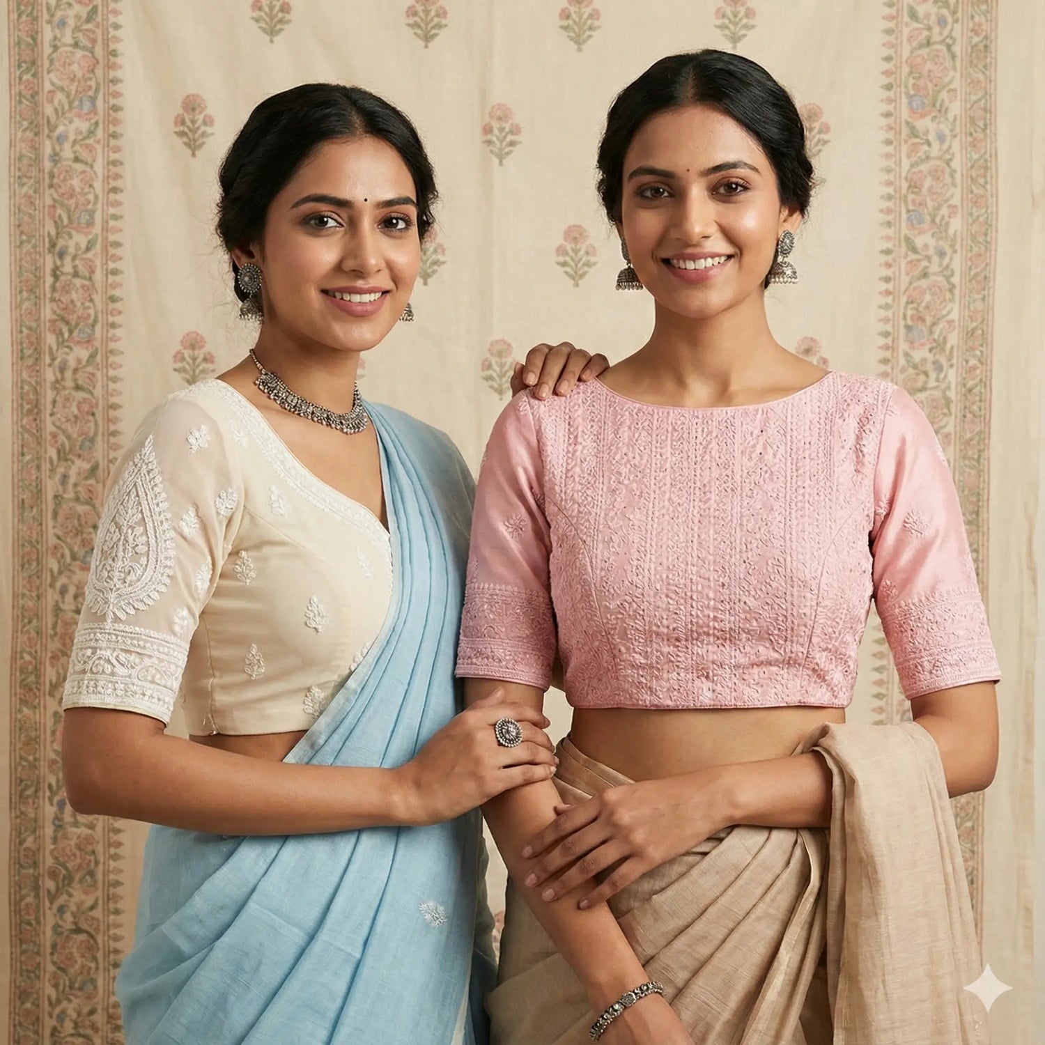Two Indian models wearing elegant Chikankari embroidered readymade saree blouses with a perfect princess cut fit.