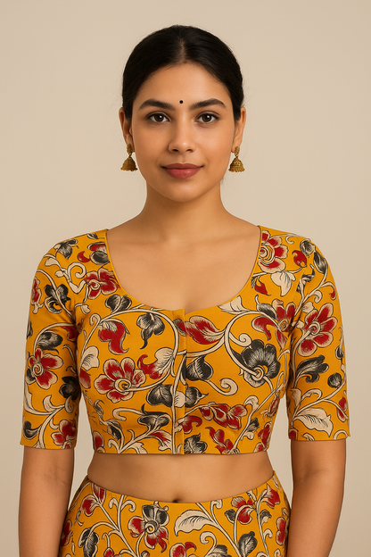 Woman wearing a  Kalamkari Csaree floral blouse against a beige background 