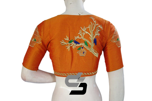 Step into sophistication with these designer mustard orange high neck saree blouses, featuring elegant embroidery for a touch of refined style to your attire.