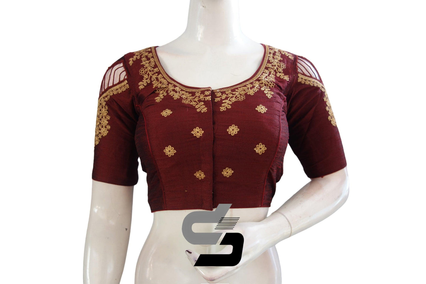 Elevate your elegance with our Red Wine High Neck Embroidered Saree Blouses, showcasing intricate detailing and rich hues for a sophisticated look.