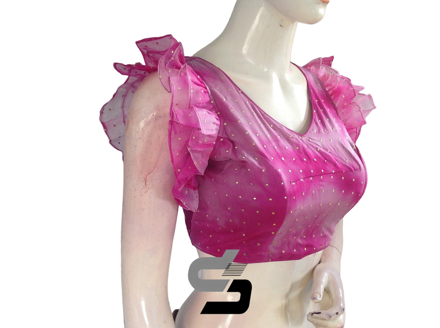 Dive into sophistication with our Magenta Marvel Tie Dye Designer V Neck Georgette Saree Blouse, featuring exquisite ruffle sleeves for a glamorous and trendy statement.