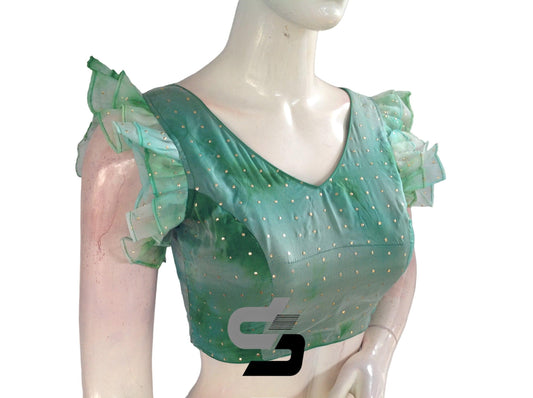 Step into style with our Green Oasis Tie Dye Designer V Neck Georgette Saree Blouse, adorned with elegant ruffle sleeves for a fresh and fashionable look.
