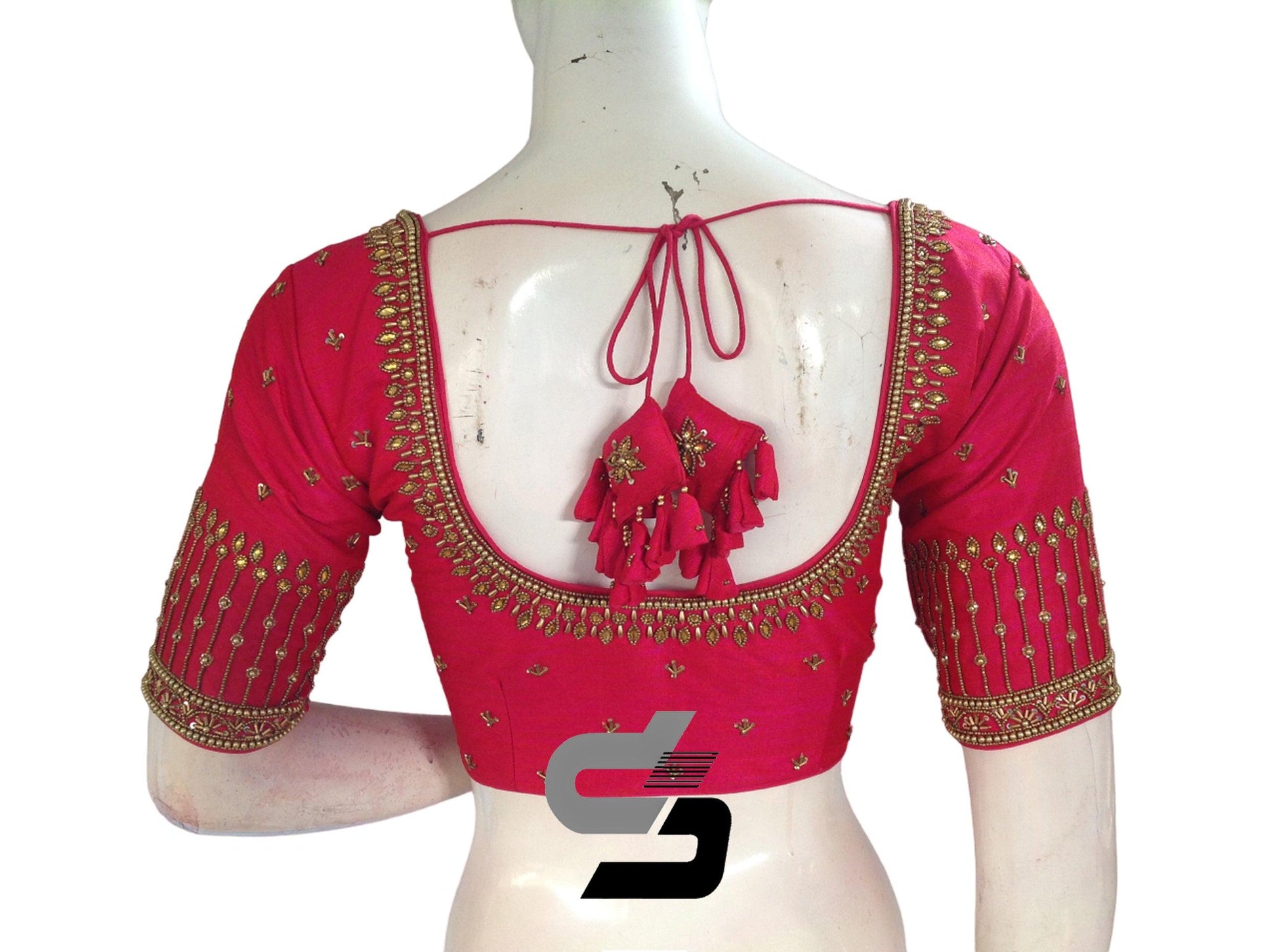 Step into the spotlight with our Radiant Pink Bridal Handwork Saree Blouse, a true embodiment of Traditional Indian Ethnic Attire. Adorned with intricate handwork, this blouse exudes radiance and elegance, adding a touch of sophistication to your bridal ensemble.