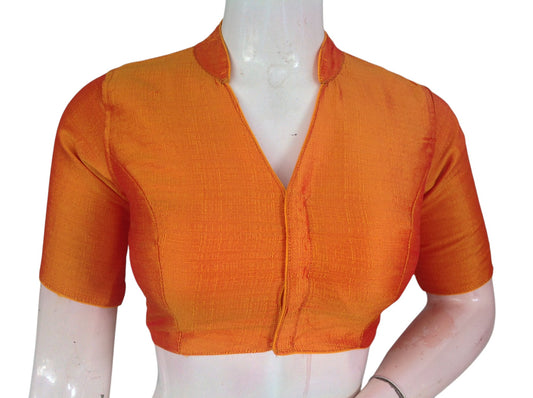 Mustard semi raw silk collar neck saree blouse with cotton lining. Stitched, padded, ready to wear in sizes 34–40. Perfect for weddings & festive sarees.