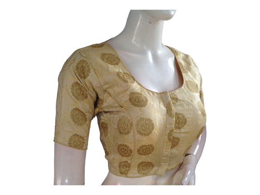 Adorn yourself in elegance with our Banana Gold Brocade Readymade Saree Blouse, a highlight of our Indian Silk Saree Blouse collection. Crafted with meticulous detail, this blouse exudes sophistication and charm, perfect for enhancing your ethnic ensemble with grace and style.
