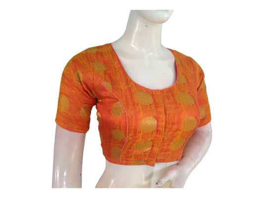 Enrich your traditional attire with our Orange Brocade Readymade Saree Blouse, a vibrant addition to our Indian Traditional Blouse collection. Crafted with intricate brocade detailing, this blouse adds a touch of cultural charm and elegance to your ensemble, perfect for celebrating traditions with style and grace.