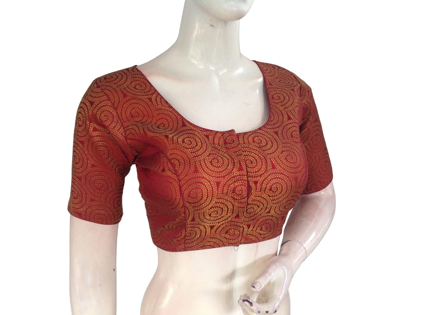 Infuse your traditional attire with elegance wearing our Maroon Brocade Readymade Saree Blouse, a classic piece from our Indian Traditional Blouse collection. Crafted with intricate brocade detailing, this blouse adds sophistication to your ensemble, perfect for celebrating cultural occasions with grace and style.