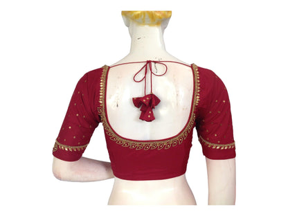 Discover the epitome of traditional elegance with our Exquisite Maroon Bridal Aari Handwork Saree Blouse, perfect for your Indian Wedding Choli. Shop now for a captivating bridal look