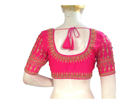 Complete your bridal look with our exquisite Pink Bridal Aari Handwork Readymade Saree Blouse. Perfect for weddings, this blouse adds elegance and tradition to your ethnic ensemble. Shop now for the perfect Indian Ethnic Wedding Choli Top.