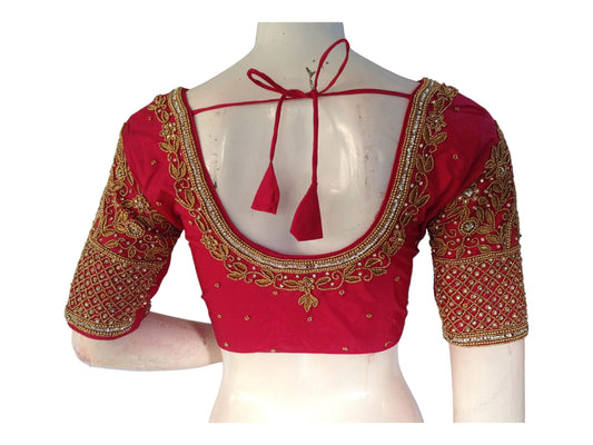 Adorn yourself in elegance with our Pink Bridal Handwork Readymade Saree Blouse. Perfect for weddings, this blouse adds a touch of tradition and charm to your ethnic ensemble. Shop now for the perfect Indian Ethnic Wedding Choli Top.