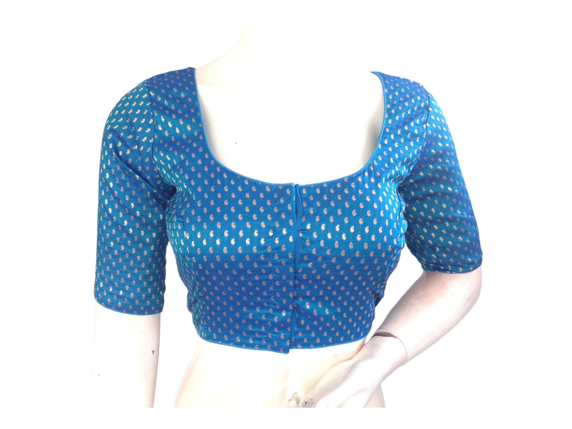 Step into sophistication with our Sky Blue Brocade Readymade Saree Blouse, tailored for plus-size wearers. With its intricate detailing, this blouse adds an elegant touch to your ensemble, perfect for elevating your ethnic attire with style and grace.