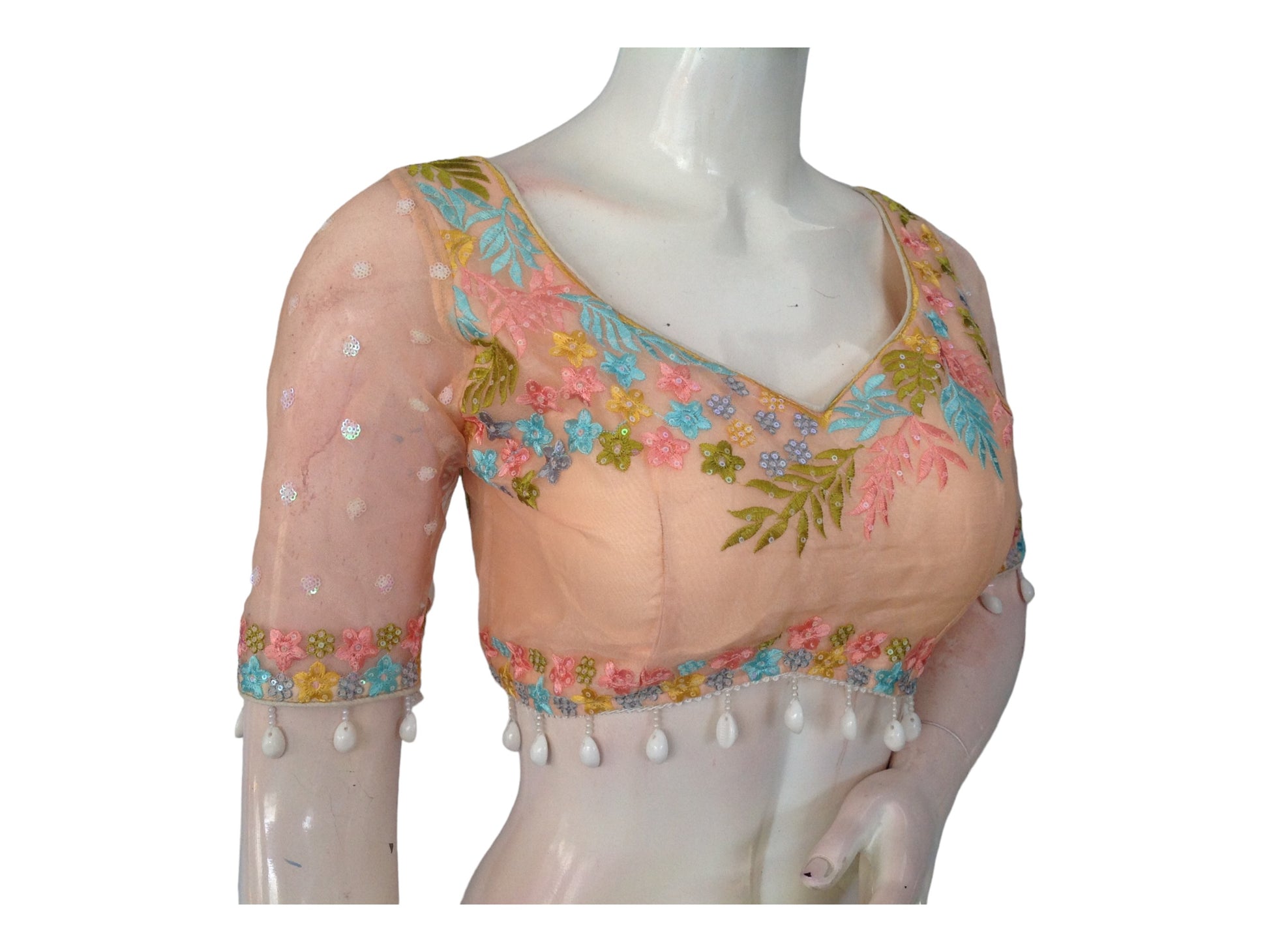 Radiate charm with "Peach Glow," our Organza Sequins Designer Readymade Saree Blouses, featuring luxurious organza and intricate sequin detailing for a graceful and stylish look.
