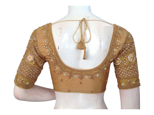 "Golden Radiance: Handcrafted Aari Bridal Silk Saree Readymade Blouse, offering luxurious design and exquisite craftsmanship for a radiant bridal look."