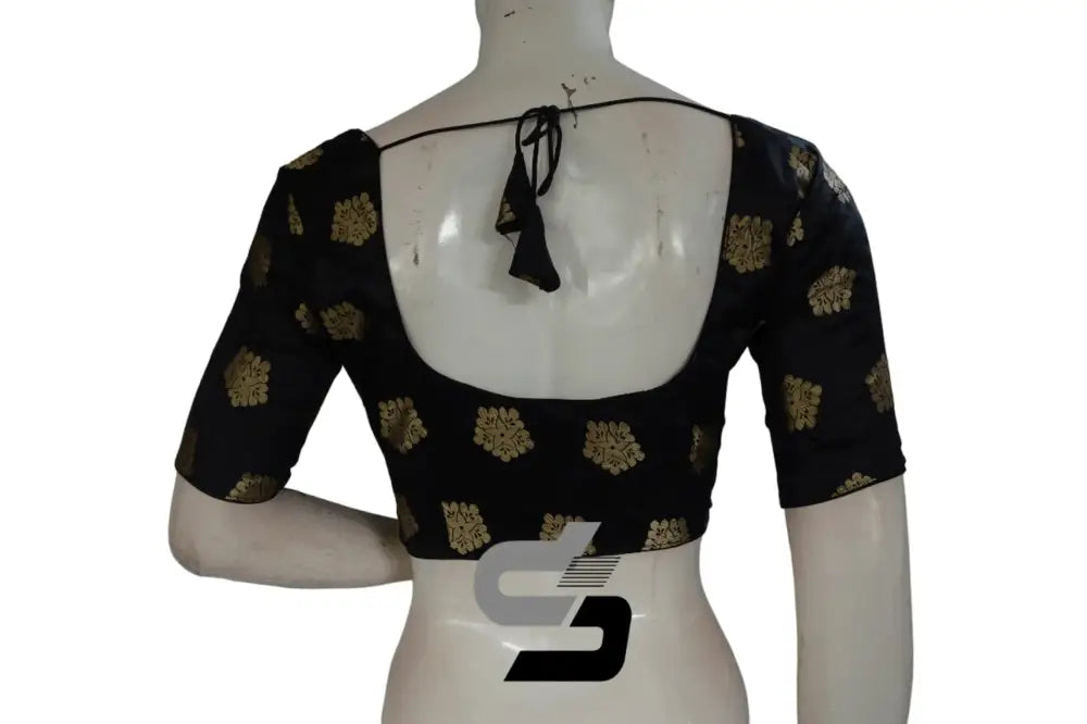 Back view of padded black readymade blouse showing deep neck and hook opening