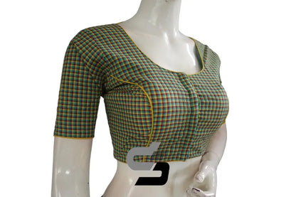 Close up of checkered pattern on green cotton designer saree blouse