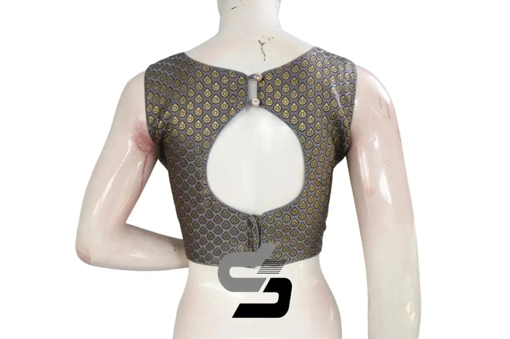 Back view of padded grey readymade saree blouse showing deep boat neck and hook fitting