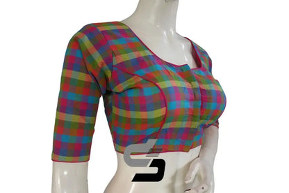 Close up of checkered pattern on pink cotton designer saree blouse with 3/4th sleeves.