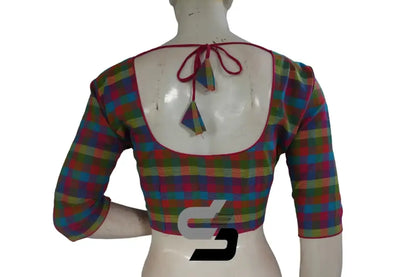 Back view of padded pink checks readymade blouse showing deep neck and hook opening.