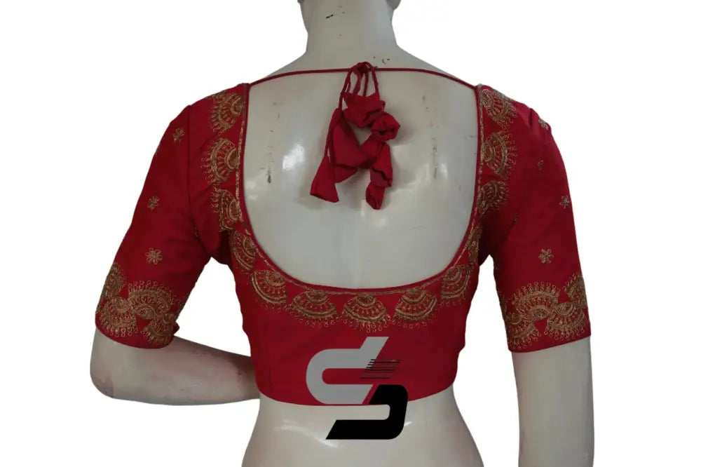 Back view of padded pink readymade saree blouse showing deep neck design and hook opening