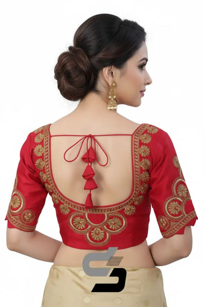 Back view of padded pink readymade saree blouse showing deep neck design and hook opening