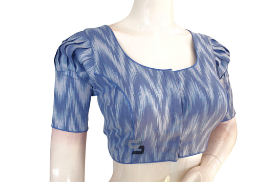 Indulge in stylish elegance with our Blue Ikkat Cotton Designer Blouse. Featuring puff sleeves, this piece adds a contemporary flair to traditional attire. Elevate your wardrobe with this versatile and chic blouse, perfect for any occasion!