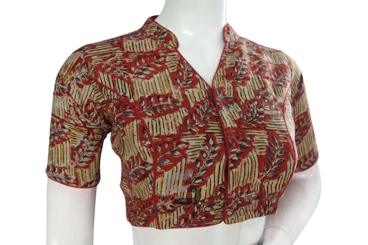Elevate your style with our bold red Kalamkari collar designer blouse, a ready-to-wear statement piece. Effortlessly blending traditional charm with modern flair, it's perfect for making a statement.