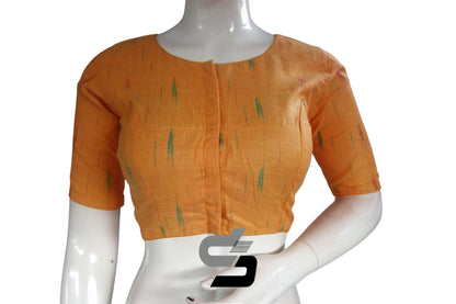 Elevate your ethnic ensemble with our Mustard Yellow Ikkat Highneck Readymade Saree Blouse. This vibrant piece adds a touch of elegance and sophistication to your traditional attire. Embrace the rich cultural heritage with this stylish and comfortable blouse, perfect for any occasion.