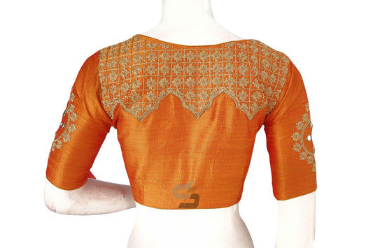 Achieve designer chic with our Mustard Embroidered High Neck Saree Blouse, blending intricate detailing and vibrant color for a sophisticated and stylish ensemble.