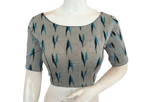Discover sophistication with our grey Ikkat cotton boat neck readymade blouse from D3 Blouses. Elevate your style effortlessly with this versatile piece, perfect for any occasion.
