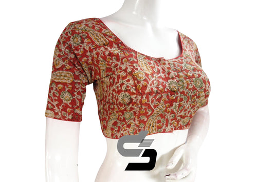 Step into timeless elegance with our Kalamkari cotton saree blouse, a ready-to-wear marvel of traditional charm and modern style. Embrace the rich heritage of Kalamkari artistry as it adorns your attire, adding a touch of sophistication to any ensemble. Effortlessly versatile, this blouse is the epitome of classic grace, making it an essential addition to your wardrobe for any occasion.