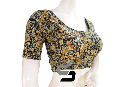 Introducing our versatile Kalamkari cotton saree blouse, embodying the essence of Indian style in a ready-to-wear design. Perfectly blending tradition with modernity, this piece is a timeless addition to any wardrobe. Whether paired with a saree or skirt, it adds an elegant touch to your ensemble, making it ideal for various occasions.