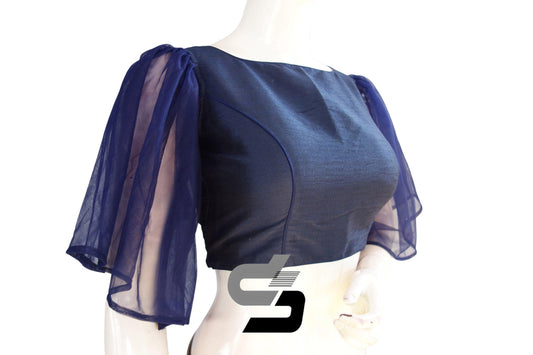 Indulge in elegance with "Navy Blue Elegance," our Plain Silk Designer Ruffle Sleeve Readymade Blouse, exuding sophistication and grace with its stylish design and graceful ruffle sleeves.
